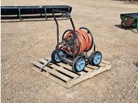 High Capacity Hand Fuel Pump and Garden Hose Caddy with Approximately 100 Ft of Hose