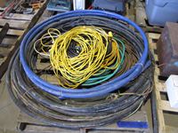    Pallet of Misc. Pipe, Extension Cords, Garden Hose, Cable