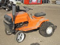    Orange Lawn Pulling Tractor