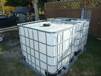    (2) Caged Poly 1000 Litre Tanks