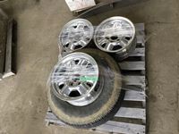    (4) Chevrolet Rims and (1) 16 Inch Tire