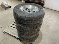    (4) Nokian 235/75R15 Tires on Ford Explorer Rims