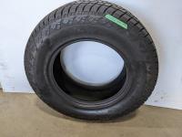 (1) Grizzly LT265/70R18 Tire
