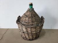 Green Glass Amphora in Woven Basket
