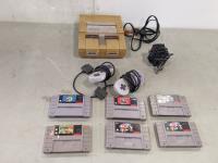 Super Nintendo Game System and (6) Game Cartridges