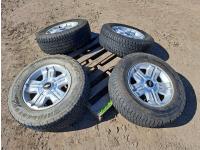 (4) Bridgestone Dueler 265/65R18 Tires On Factory Chevrolet Rims