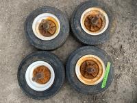(4) Trailer Wheels On 1-1/4 Inch Axle Stubs